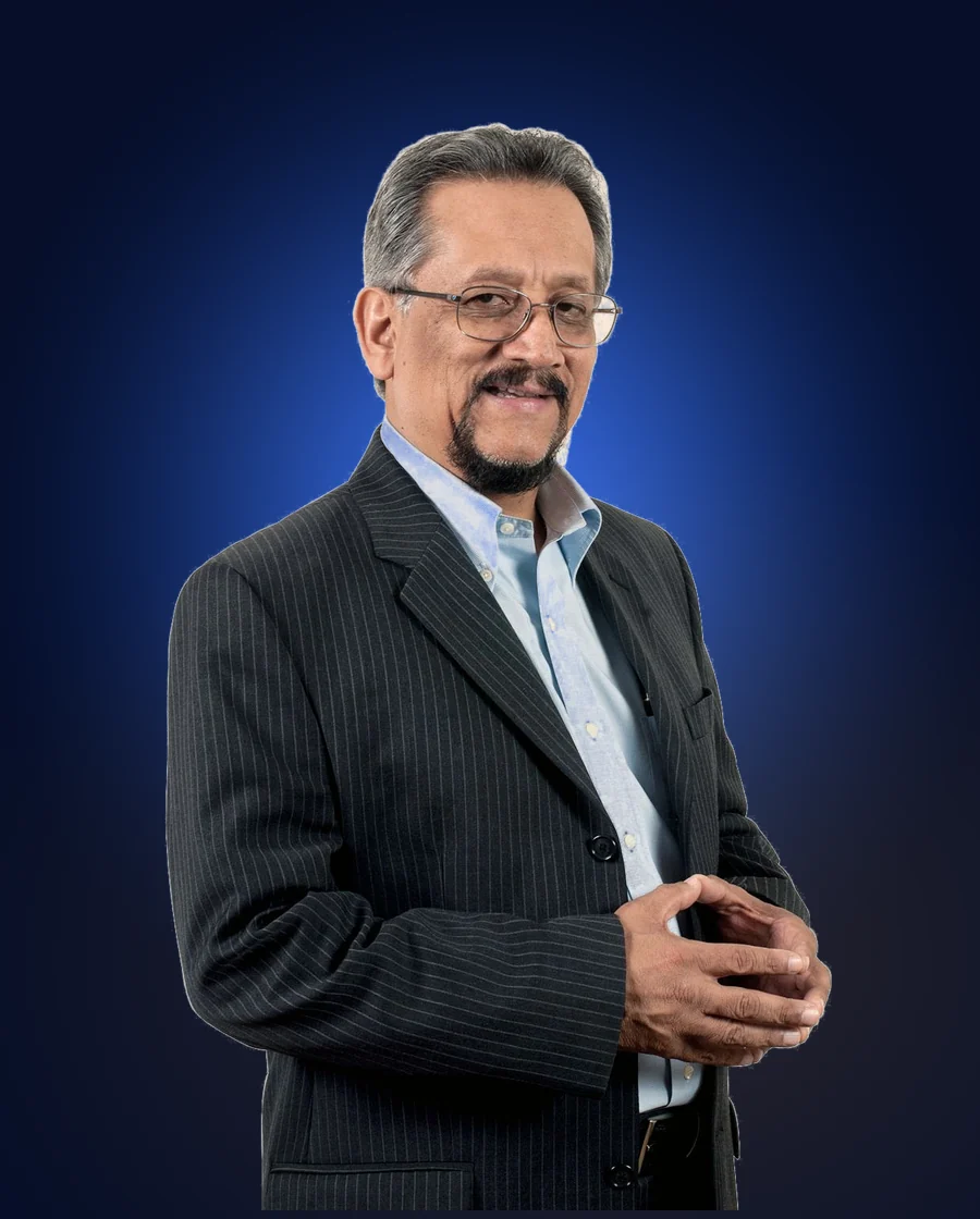 Dr. Edmundo Velasco con saco gris